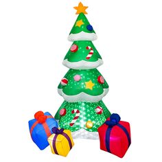 an inflatable christmas tree with presents around it on a white background for decoration