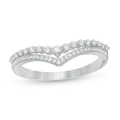 a white gold ring with diamonds on it