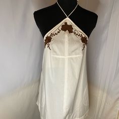 Free People Embroidered Pockets Halter Sun Dress Size L Nwot Beach Embroidered Dress With Lace Trim, Embroidered Sundress For Beach, Bohemian Embroidered Cotton Dress With Lace Trim, Bohemian Cotton Embroidered Dress With Lace Trim, Beach Boho Cotton Dress Embroidered, Cotton Peasant Embroidered Beach Dress, Beach Embroidered Cotton Boho Dress, White Cotton Boho Sundress, Embroidered Cotton Mini Dress For Vacation