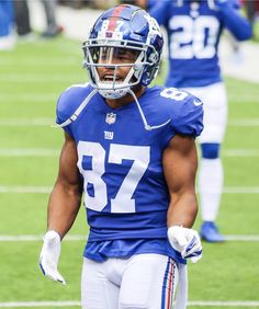 a football player is standing on the field