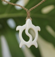 Beautifully handcrafted Buffalo bone handcrafted pendant on woven adjustable jute neck cord. Polished and detailed to bring out the best in each design. Set includes one of each Fish hook, Whale Tail and Petroglyph Honu! Individually boxed to give as gifts. Great quality and style at an affordable low price! Our buffalo bone pendants are great in and out of the water so you never have to take them off. Braided cording is adjustable so it fits from keiki to adults. Great for men and women, boys a Artisan Adjustable Natural Color Necklaces, Artisan Adjustable Natural Necklaces, Artisan Adjustable Natural Necklace, Traditional Jewelry With Sliding Knot For The Beach, Traditional Natural Color Necklace For Gift, Unique Adjustable Natural Color Necklace, Traditional Necklace As A Gift, White Waxed Cord Beach Jewelry, Artisan Jewelry With Adjustable Cord For Beach