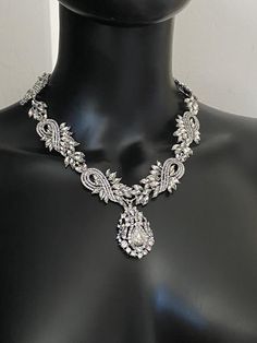 Crystal statement necklace.You can wear this silver rhinestone necklace to transform into a chic look  Perfect for weddings, proms and formal events,  add the finishing  nice sparkle touch to outfit.This necklace fits the style of the crown.https://www.etsy.com/listing/724810636/bridal-crownsilver-crown-sparkling?ref=shop_home_active_1&sca=1 Crystal Rhinestone Pendant Necklace With Clavicle Chain, Glamorous Crystal Collarbone Chain Necklace, Glamorous Metal Rhinestone Clavicle Necklace, Glamorous Gold Rhinestone Crystal Necklace, Luxury Rhinestone Crystal Necklace Statement Piece, Shoulder Jewelry, Silver Tiara, Crystal Statement Necklace, Rhinestone Tiara