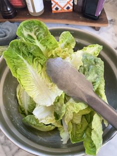 a salad with lettuce in a bowl on a table