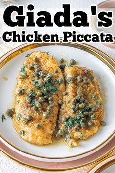 two pieces of chicken on a white plate with green garnish and the words giada's chicken piccata above it