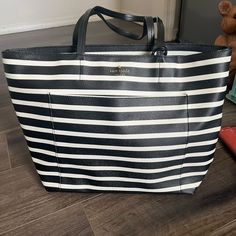 Kate Spade Striped Tote Bag, New Without Tags Casual Kate Spade Tote Bag, Kate Spade Casual Bag For Daily Use, Casual Kate Spade Bag For Daily Use, Casual Kate Spade Shoulder Bag, Kate Spade White Travel Shoulder Bag, Kate Spade White Shoulder Bag For Travel, Kate Spade White Shoulder Bag With Leather Handles, White Kate Spade Shoulder Bag For Travel, Black And White Tote Shoulder Bag For Everyday Use