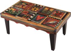 a wooden table with many pictures on the top and bottom, all painted in different colors