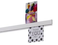 a happy you day card hanging from a clothes line with polka dots and balloons on it