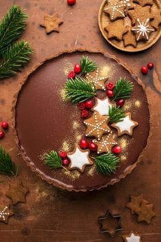 a chocolate tart decorated with christmas decorations