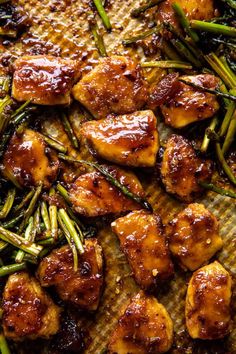 chicken and asparagus on a tray ready to be cooked