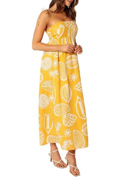 A bright tropical pattern puts a sunny spin on a maxi dress that's a breath of fresh air for your warm-weather wardrobe. Hidden back-zip closure Square neck Adjustable tie straps Lined 95% cotton, 5% linen Hand wash, line dry Imported Yellow Floral Print Vacation Dress, Yellow Sundress For Vacation, Summer Tropical Print Sundress Maxi, Summer Tropical Print Sundress Maxi Dress, Spring Tropical Maxi Dress, Vacation Maxi Dress With Tropical Print, Tropical Maxi Sundress For Day Out, Tropical Maxi Dress For Spring, Yellow Beach Sundress For Vacation