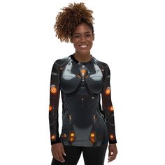 Embrace the future of fashion with the Women's Black Cyberpunk Robot Rash Guard, a perfect blend of edgy style and high-performance functionality. This sleek rash guard features a striking cyberpunk robot design set against a classic black backdrop, offering a bold, futuristic aesthetic. Engineered for maximum comfort and protection, it provides excellent UV defense and a snug, flexible fit ideal for surfing, swimming, or any intense water activity. Made from premium, quick-drying fabric, this rash guard ensures you stay cool and comfortable both in and out of the water. Make a statement and protect your skin with the Women's Black Cyberpunk Robot Rash Guard, where cutting-edge design meets superior performance. * 82% polyester, 18% spandex * 6.78 oz/yd² (230 g/m²) (weight may vary by 5%) Futuristic Fitted Black Top, Fitted Futuristic Black Top, Black Cyberpunk, Cyberpunk Robot, Water Activity, Futuristic Aesthetic, Future Of Fashion, Black Backdrop, Black Backdrops