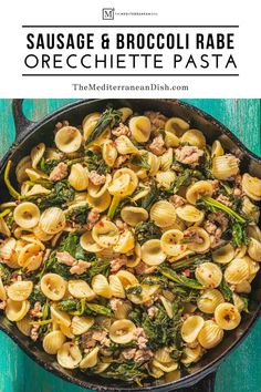 sausage and broccoli rabe orecchini pasta in a cast iron skillet