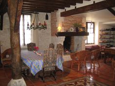 the dining room is decorated in rustic style