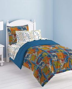 a child's bedroom with blue walls and white flooring is decorated in bright colors