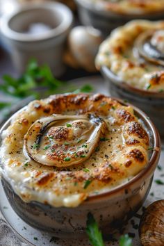 Baked creamy mushroom soup topped with melted cheese and herbs in a bowl. Oyster Stew Recipes, Canned Oysters, Thai Coconut Curry Soup, Rich Beef Stew, Stew With Potatoes, Seafood Stew Recipes, Cooked Oysters, Oyster Stew, Coconut Curry Soup