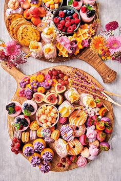 two wooden trays filled with different types of food