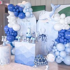 an ocean themed party with balloons and decorations