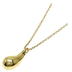 TIFFANY & Co. Elsa Peretti 18K Gold Teardrop Pendant Necklace Metal: 18K Yellow Gold Chain: 16" long Pendant: 12.5mm long Weight: 4.30 grams Hallmark: "©T&Co. PERETTI 750" on pendant, "TIFFANY&Co. 750 PERETTI" on chain tags Condition: Excellent condition, like new Authenticity Guaranteed Gold Pear-shaped Drop Necklace For Formal Events, Gold Pear-shaped Drop Necklace For Formal Occasions, Pear-shaped Gold Drop Necklace For Formal Occasions, Formal Gold Pear-shaped Drop Necklace, Luxury 14k Gold Drop Necklace, Luxury Yellow Gold Drop Necklaces, Luxury Yellow Gold Long Drop Necklace, Luxury Long Drop Yellow Gold Necklace, Luxury Yellow Gold Briolette Drop Necklace