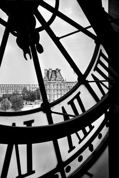 a large clock with roman numerals on it