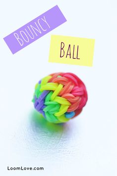 a colorful ball with the word bouncey on it and a sticky note attached to it