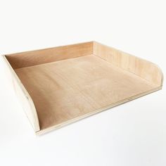 an empty wooden tray on a white background