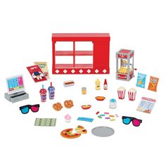 a play set with food and sunglasses on the floor, including a hot dog stand