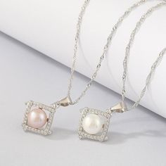 Style: Female Material: S925 Sterling Silver, Bread Pearl Pearl Type: Cultured Pearl Color: White & Pink Pearl Size: 6.5mm 7.5mm Necklace Length: 40+5cm Elegant Sterling Silver Square Pendant Jewelry, Silver Jewelry With Square Pearl Pendant, Pearl White Sterling Silver Pendant Jewelry, Silver Sterling Silver Pearl Necklace Fine Jewelry, Sterling Silver Pearl Necklace In Fine Jewelry Style, Sterling Silver Fine Jewelry Pearl Necklace, Elegant White Square Pendant Jewelry, Silver Sterling Silver Pearl Necklace With Gemstone, Sterling Silver Pendant Pearl Necklace In Diamond White