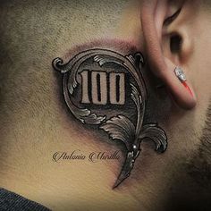 a man with a tattoo on his neck and behind the ear is an image of a sign that reads 100