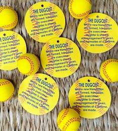 some yellow and red baseballs with the words the dugout written on each one