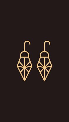 two gold earrings with diamond shapes on them, one in the shape of an ornament