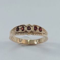 This stunning  style ring has been carefully crafted from scratch in 10k Solid Yellow Gold, and authentic garnet stone. Great for any occasion! Buy it for your-self or for someone you love! This beautiful ring will not go unnoticed. All of my jewelry is handmade from scratch and of high quality. A tracking shipping number will be provided to you once ring has been mailed. Ring Measurements and Materials: Ring is size 7 but can be resized at no extra cost and will be shipped to you in an elegant Gold Garnet Ring Vintage, Stone Ring Women, Medieval Ring, Gold Garnet Ring, Garnet Ring Vintage, Medieval Rings, Red Garnet Ring, Red Stone Ring, Garnet And Gold