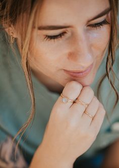 A versatile ring – rock this beauty three different ways! Two 1mm bands (hammered flat) that meet on the sides—united on top with wire wrapping. Available in 14kt Gold Fill + Sterling Silver. Jess pairs it with our Cigar Band, Dani Chain Ring, and two Confetti Rings. On her other hand, Jess is wearing our Dylan Chain Ring and Swell Ring. Jess B. styles it with our Charlie Bracelet, Confetti Bracelet, Goldie Bracelet and Confetti Ring. Handmade in Eau Claire, WI. Our jewelry is handmade so each p Stackable Double Band Promise Jewelry, Adjustable Hammered Jewelry For Promise, Everyday Hammered Stackable Rings, Simple Adjustable Hammered Jewelry, Dainty Hand Forged Rings For Everyday, Dainty Adjustable Hand Forged Stackable Rings, Dainty Hand Forged Adjustable Stackable Rings, Gold Minimalist Wire Wrapped Stackable Rings, Minimalist Gold Wire Wrapped Stackable Rings