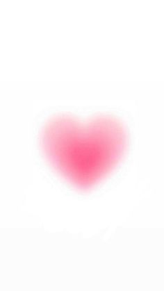 a red heart shaped object on a white background with the word love written below it