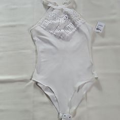 - All White Charlotte Russe Body Suit - Lace Like Stitching Print In Front - Brand New With Tag - Size Xs Fitted Bodysuit For Spring And Summer, Feminine Fitted Bodysuit For Summer, Fitted Spring Beachwear Bodysuit, Fitted Feminine Bodysuit For Summer, Elegant Spring Halter Neck Bodysuit, Spring Halter Neck Stretch Bodysuit, Stretch Halter Neck Bodysuit For Spring, Spring Stretch Halter Neck Bodysuit, Summer Halter Neck Fitted Bodysuit