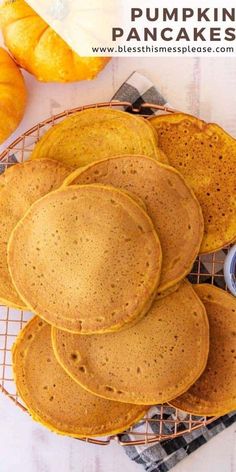 pumpkin pancakes cooling on a wire rack