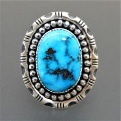 Handcrafted by E.Gofman sterling silver oval Kingman turquoise southwestern unisex ring size 8.5 ITEM SPECIFICS METAL   SILVER METAL STAMP/HALLMARK925 SIZE  8.5 WIDTH (inches/mm)  0.81 / 20.7 WEIGHT ( gram )  18.6 Silver Gift Wrap, Signet Rings, Kingman Turquoise, Unisex Ring, Blue Band, Silver Gifts, Signet Ring, Metal Stamping, Sterling Silber