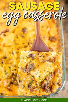 sausage egg casserole in a glass dish with a wooden spoon