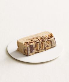 a piece of food sitting on top of a white plate