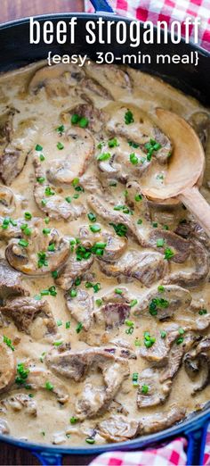 beef stroganoni in a creamy sauce with parsley garnish on the side