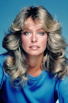 A glam guide to '70s hair 70’s Hair, Look Disco, Fitness Queen, 1970s Hairstyles, Farrah Fawcet, Look 80s, 70s Hair, Farrah Fawcett, Long Blonde