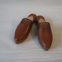 Nwt Womens Klik "Anni" Saddle Brown Leather Cut-Out Mules Sz 6* 1.25" Platform Material: Leather Measurements (Flat): Width: 3" Length: 9.75" Heel: 1.25" New With Tags .. (Bag 1)..605_nanc_olick-1 Brown Pointed Toe Clogs For Spring, Casual Faux Leather Slip-on Heels, Casual Leather Clogs With Pointed Toe, Casual Leather Pointed Toe Clogs, Spring Faux Leather Slip-on Clogs, Casual Faux Leather Clogs For Spring, Casual Brown Clogs With Pointed Toe, Brown Synthetic Almond Toe Mules, Studded Clogs