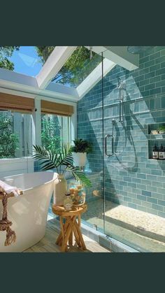 a bathroom with a skylight and a bathtub