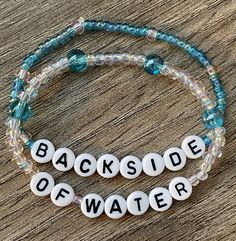 Whether you know it as the eighth wonder of the world or O2H, we all refer to it as The Backside Of Water! This set of two handmade beaded stretch bracelets is perfectly beaded in blue and iridescent hues just the the famous Falls from the cruise.  This bracelet stack is suited for passengers or skippers of this world famous cruise! Bracelets are available in a variety of lengths.  Pick your custom length from the drop down menu below.  All our bracelets are made with quality in mind.  With that Cruise Bracelets, Disney Diys, Water Bracelet, Travel Bracelet, Wonder Of The World, Disney 2024