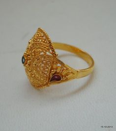 TRADITIONAL DESIGN 20k GOLD RING FROM RAJASTHAN INDIA, GREAT HANDMADE DESIGN, MADE OF SOLID 20 CARAT YELLOW GOLD, GOOD FOR JEWELLERY COLLECTION. Usa ring size - 7 (we can adjust the size)Width of top - 1.7 cm(0.67")weight - 4 gramsMaterial - 20k solid yellow gold. Gold Meenakari Rings For Festive Occasions, Gold Rings With Meenakari For Festive Occasions, Festive Gold Ring With Meenakari, Festive Gold Ring With Meenakari Detail, Traditional 22k Gold Wedding Ring, 22k Gold Temple Jewelry Wedding Ring, Traditional Gold Filigree Wedding Ring, Traditional Gold Filigree Ring For Wedding, 22k Gold Filigree Wedding Ring