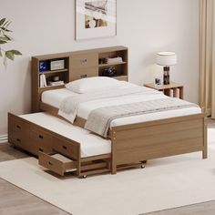 a bed with drawers underneath it and a white rug on the floor next to it