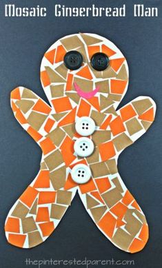 a mosaic gingerbread man with buttons on it's face and the words mosaic gingerbread man