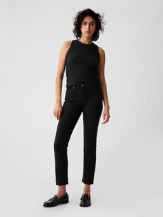 Fit: A slim, ankle-length classic.  More room than our True Skinny, but just as comfortable.  Fabric: 93% Cotton, 5% Recycled Materials, 2% Stretch.  Stretch: Stretch Jeans.  A bit of hug & a lot of hold.  Comfortable & designed to flatter. ​ Rise: Mid Rise Jeans.  Look: A classic five-pocket jean in a black wash.  Details: Zip fly, five-pocket styling & holds-you-in front pockets.  Responsibly Made: This pair of jeans is part of our water-saving Washwell program.  Compared to conventional wash Fitted Gap Jeans For Everyday Wear, Fitted Gap Jeans For Everyday, Everyday Fitted Jeans By Gap, Jeans Look, Ankle Length Jeans, Jean Vintage, Water Saving, Mid Rise Jeans, Pocket Jeans