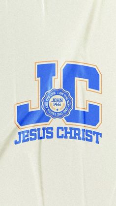 the jersey is white with blue and orange letters on it's chest, which reads jesus christ