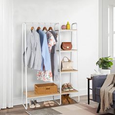 Do you always worry about your messy room? Do you want to put your clothes in order? If so, you won't miss this Maikki. This metal rack provides a huge storage space for clothes, scarves, neckties, bags, and other items. In addition, it has a flexible side hook that allows you to hang clothes, suits, coats, hats, bags, etc. What are you waiting for? Take it home! Rebrilliant Color: White | Rebrilliant Maikki 39.3701" Clothes Rack 59.0551 H x 39.3701 W x 15.748 D in Metal in White | 27" L | Wayfa Industrial Clothing Rack, Clothing Rack Bedroom, Closet Rack, Corner Wardrobe, Portable Wardrobe, Small Wardrobe, Garment Rack, White Storage, Metal Clothing