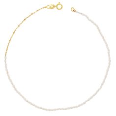 Our Dainty Pearl Anklet is an absolute must have in every jewelry collection. A dainty 14K Gold chain mixed with precious Pearl beads is the perfect sweet statement that will elevate your shoe game or better yet  your bare feet in the sand. SO whether you're vacay bound or meeting your besties for brunch, this anklet is the vibe that your fit needs!

Size: 1.5-2mm rice shaped freshwater pearls 
Size: 9.5”
14K Solid Gold
Lifetime Guarantee
Made in Los Angeles Elegant Beaded Chain Anklets, White Beaded Chain Anklets As Gift, White Beaded Chain Anklets For Gift, Elegant White Anklets With Pearl Chain, Elegant White Pearl Chain Anklets, Elegant Adjustable Beaded Chain Anklets, Feet In The Sand, Pearl Anklet, Pearl Size